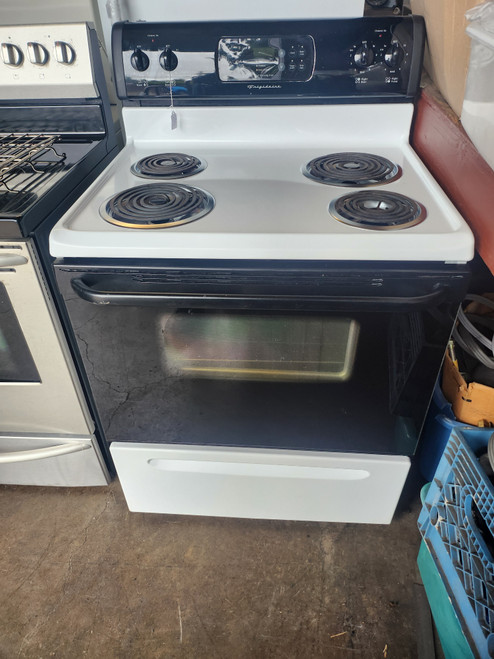 FRIGIDAIRE 30 INCH FREESTANDING ELECTRIC RANGE COIL BURNERS 2 LARGE 2 SMALL SELF CLEANING RANGE BLACK GLASS DOOR WHITE TOP AND BODY LOCATED IN OUR PORTLAND OREGON APPLIANCE STORE SKU 19294