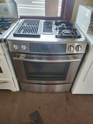 JENN-AIR 30 INCH DOWN DRAFT DUAL FUEL RANGE GAS TOP WITH 2 BURNER GRILL ON LEFT ELECTRIC OVEN CONVECTION RAPID PREHEAT SELF CLEANING OVEN STAINLESS LOCATED IN OUR PORTLAND OREGON APPLIANCE STORE SKU 19298