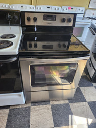 WHIRLPOOL 30 INCH FREESTANDING SMOOTH TOP ELECTRIC RANGE 4 BURNER 1 LARGE DUAL 1 LARGE 2 SMALL SELF CLEANING OVEN BLACK AND STAINLESS LOCATED IN OUR PORTLAND OREGON APPLIANCE STORE SKU 19312