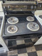 GE30 INCH FREESTANDING ELECTRIC RANGE COIL BURNERS 2 LARGE 2 SMALL HI LO BROIL OPTION SELF CLEANING OVEN BLACK LOCATED IN OUR PORTLAND OREGON APPLIANCE STORE SKU 19316