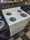 HOTPOINT 30 INCH FREESTANDING ELECTRIC RANGE MANUAL CLEAN OVEN COIL BURNERS 3 SMALL 1 LARGE WHITE LOCATED IN OUR PORTLAND OREGON APPLIANCE STORE SKU 19317