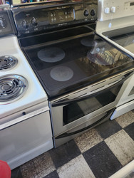 FRIGIDAIRE 30 INCH FREESTANDING SMOOTH TOP ELECTRIC RANGE 4 BURNER 2 LARGE 2 SMALL SELF CLEANING OVEN STAINLESS FRONT AND BLACK TOP AND SIDES STORAGE DRAWER SKU 19318