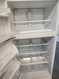 WHIRLPOOL 20 CUBIC FOOT REFRIGERATOR TOP FREEZER GLASS SHELVES 2 CRISPER DRAWERS 1 MEAT PAN WIRE SHELF IN FREEZER WHITE LOCATED IN OUR PORTLAND OREGON APPLIANCE STORE SKU 19324