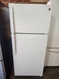 GE 16 CUBIC FOOT REFRIGERATOR TOP FREEZER WIRE SHELVES WITH 2 CRISPER DRAWERS GLASS COVER FULL WIDTH WIRE SHELF IN FREEZER WHITE LOCATED IN OUR PORTLAND OREGON APPLIANCE STORE SKU 19346