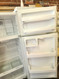 GE 16 CUBIC FOOT REFRIGERATOR TOP FREEZER WIRE SHELVES WITH 2 CRISPER DRAWERS GLASS COVER FULL WIDTH WIRE SHELF IN FREEZER WHITE LOCATED IN OUR PORTLAND OREGON APPLIANCE STORE SKU 19346