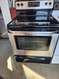 FRIGIDAIRE 30 INCH FREESTANDING ELECTRIC RANGE GLASS TOP 4 BURNER SELF CLEANING RANGE BLACK AND STAINLESS LOCATED IN OUR PORTLAND OREGON APPLIANCE STORE SKU 19349