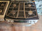 JENN-AIR 30 INCH SLIDE-IN DOWN DRAFT GAS RANGE 4 BURNERS RAPID PREHEAT CONVECTION SELF CLEANING OVEN HEAVY DUTY BURNER GRATES STAINLESS LOCATED IN OUR PORTLAND OREGON APPLIANCE STORE SKU 19358
