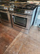 JENN-AIR 30 INCH SLIDE-IN DOWN DRAFT GAS RANGE 4 BURNERS RAPID PREHEAT CONVECTION SELF CLEANING OVEN HEAVY DUTY BURNER GRATES STAINLESS LOCATED IN OUR PORTLAND OREGON APPLIANCE STORE SKU 19358