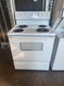 HOTPOINT 30 INCH ELECTRIC FREESTANDING RANGE MANUAL CLEAN OVEN COIL BURNERS 2 SMALL 2 LARGE WHITE LOCATED IN OUR PORTLAND OREGON APPLIANCE STORE SKU 19367