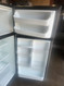 FRIGIDAIRE 18 CUBIC FOOT REFRIGERATOR TOP FREEZER GLASS SHELVES 2 CRISPER DRAWERS 1 DELI PAN WIRE SHELF IN FREEZER STAINLESS LOCATED IN OUR PORTLAND OREGON APPLIANCE STORE SKU 19371