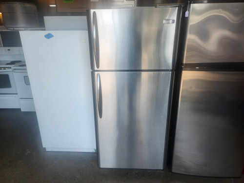 FRIGIDAIRE 18 CUBIC FOOT REFRIGERATOR TOP FREEZER GLASS SHELVES 2 CRISPER DRAWERS 1 DELI PAN WIRE SHELF IN FREEZER STAINLESS LOCATED IN OUR PORTLAND OREGON APPLIANCE STORE SKU 19371