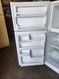 WHIRLPOOL 18 CUBIC FOOT REFRIGERATOR WIRE SHELVES 2 CRISPER DRAWERS WITH GLASS COVER 1 DELI DRAWER FULL WIDTH WIRE SHELF IN FREEZER WHITE LOCATED IN OUR PORTLAND OREGON APPLIANCE STORE SKU 19390