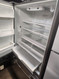 JENN-AIR 20 CUBIC FOOT COUNTER REFRIGERATOR WITH ICE AND WATER ADJUSTABLE GLASS 2 CRISPER DRAWERS 1 LARGE DELI PULL OPEN FREEZER FEW DINGS TOP OF FREEZER DOOR STAINLESS LOCATED IN OUR PORTLAND OREGON APPLIANCE STORE SKU 19392