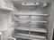JENN-AIR 20 CUBIC FOOT COUNTER REFRIGERATOR WITH ICE AND WATER ADJUSTABLE GLASS 2 CRISPER DRAWERS 1 LARGE DELI PULL OPEN FREEZER FEW DINGS TOP OF FREEZER DOOR STAINLESS LOCATED IN OUR PORTLAND OREGON APPLIANCE STORE SKU 19392