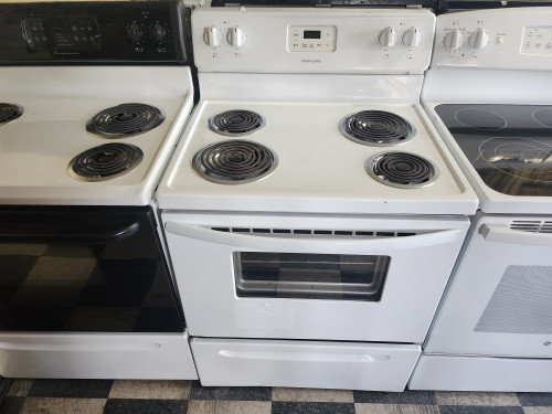 FRIGIDAIRE 30 INCH FREE STANDING ELECTRIC RANGE MANUAL CLEAN OVEN COIL BURNERS 2 LARGE 2 SMALL STORAGE DRAWER WHITE LOCATED IN OU PORTLAND OREGON APPLIANCE STORE SKU 19401