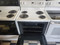 FRIGIDAIRE 30 INCH FREE STANDING ELECTRIC RANGE MANUAL CLEAN OVEN COIL BURNERS 2 LARGE 2 SMALL STORAGE DRAWER WHITE LOCATED IN OU PORTLAND OREGON APPLIANCE STORE SKU 19401
