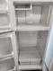 GE 18 CUBIC FOOT REFRIGERATOR TOP FREEZER WIRE SHELVES 2 CRISPER DRAWERS WHITE LOCATED IN OUR PORTLAND OREGON APPLIANCE STORE SKU 19402