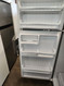 GE 18 CUBIC FOOT REFRIGERATOR TOP FREEZER WIRE SHELVES 2 CRISPER DRAWERS WHITE LOCATED IN OUR PORTLAND OREGON APPLIANCE STORE SKU 19402