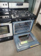 WHIRLPOOL 30 INCH FREESTANDING GAS RANGE SELF CLEANING 4 BURNER CUSTOM BROIL BLACK AND STAINLESS LOCATED IN OUR PORTLAND OREGON APPLIANCE STORE SKU 19403