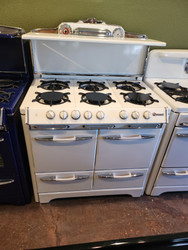 O'KEEFE MERRITT 38 INCH VINTAGE GAS RANGE 6 BURNERS 2 OVENS WITH 2 BROILERS SALT AND PEPPER SHAKERS LIGHTED SURFACH CANOPY FOR BURNERS OR SHELF WHITE WITH CHROME ACCENTS LOCATED IN OUR PORTLAND OREGON APPLIANCE STORE SKU 19414