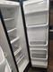 WHIRLPOOL 25 CUBIC FOOT SIDE BY SIDE REFRIGERATOR WITH ICE AND WATER GLASS SHELVES 3 WIRE SHELVES AND PULL OUT BASKET IN FREEZER BLACK LOCATED IN OUR PORTLAND OREGON APPLIANCE STORE SKU 19415
