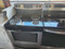FRIGIDAIRE 30 INCH FREESTANDING ELECTRIC RANGE 4 COIL BURNERS 2 LARGE 2 SMALL SELF CLEANING OVEN WARM AND HOLD OPTION STORAGE DRAWER BLACK AND STAINLESS LOCATED IN OUR PORTLAND OREGON APPLIANCE STORE 19460