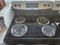 FRIGIDAIRE 30 INCH FREESTANDING ELECTRIC RANGE 4 COIL BURNERS 2 LARGE 2 SMALL SELF CLEANING OVEN WARM AND HOLD OPTION STORAGE DRAWER BLACK AND STAINLESS LOCATED IN OUR PORTLAND OREGON APPLIANCE STORE 19460