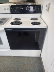 WHIRLPOOL 30 INCH FREESTANDING ELECTRIC RANGE COIL BURNERS 3 SMALL 1 LARGE SELF CLEANING OVEN WHITE WITH BLACK GLASS OVEN DOOR LOCATED IN OUR PORTLAND OREGON APPLIANCE STORE SKU 19487