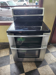 Whirlpool Gold 30 Inch Freestanding Electric Double Oven Range with 4 Radiant Elements, Warm Zone, 4.2 cu. ft. Lower Oven Capacity, Energy Save Mode, Precise Clean Self-Cleaning and 2.5 cu. ft. Upper Oven Capacity: Stainless Steel SKU 19493