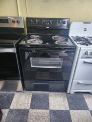 WHIRLPOOL 30 INCH FREESTANDING ELECTRIC RANGE MANUAL CLEAN OVEN COIL BURNERS 2 LARGE 2 SMALL STORAGE DRAWER BLACK LOCATED IN OUR PORTLAND OREGON APPLIANCE STORE SKU 19502