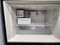 Frigidaire Professional logo 20.6 Cu. Ft. Top Freezer Refrigerator with Water Through-the-Door Dispenser & 4 Adjustable Glass Shelves: