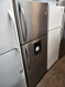 Frigidaire Professional logo 20.6 Cu. Ft. Top Freezer Refrigerator with Water Through-the-Door Dispenser & 4 Adjustable Glass Shelves:
