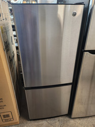 GE 24 Inch Bottom-Freezer Refrigerator with 10.5 cu. ft. Capacity, 2 Adjustable Glass Shelves, Gallon Door Bin Storage, LED Lighting, Air Tower, Upfront Electronic Temperature Control STAINLESS LOCATED IN OUR PORTLAND OREGON APPLIANCE STORE SKU 19531
