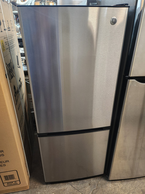GE 24 Inch Bottom-Freezer Refrigerator with 10.5 cu. ft. Capacity, 2 Adjustable Glass Shelves, Gallon Door Bin Storage, LED Lighting, Air Tower, Upfront Electronic Temperature Control STAINLESS LOCATED IN OUR PORTLAND OREGON APPLIANCE STORE SKU 19531
