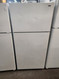 HOTPOINT REFRIGERATOR 14 CUBIC FOOT TOP FREEZER WIRE SHELVES 2 CRISPER DRAWERS COSMETIC ISSUES ON DOORS WHITE LOCATED IN OUR PORTLAND OREGON APPLIANCE STORE SKU 19543