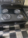 WHIRLPOOL 30 INCH FREESTANDING ELECTRIC RANGE MANUAL CLEAN COIL BURNES 2 LARGE 2 SMALL BLACK LOCATED IN OUR PORTLAND OREGON APPLIANCE STORE SKU 19546