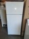 GE 16 CUBIC FOOT REFRIGERATOR TOP FREEZER ADJUSTABLE WIRE SHELVES 2 CRISPER DRAWERS WHITE LOCATED IN OUR PORTLAND OREGON APPLIANCE STORE SKU 19553