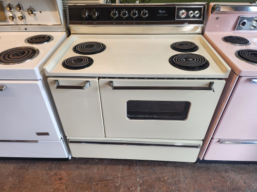 WHIRLPOOL 40 INCH FREESTANDING ELECTRIC RANGE 4 COIL BURNERS 2 LARGE 2 SMALL CONTINUOUS CLEANING OVEN SIDE AND BOTTOM STORAGE DRAWERS' ALMOND WITH BLACK HANDLES LOCATED IN OUR PORTLAND OREGON APPLIANCE STORE SKU 19614 WHIRLPOOL 40 INCH FREESTANDING ELECTRIC RANGE 4 COIL BURNERS 2 LARGE 2 SMALL CONTINUOUS CLEANING OVEN SIDE AND BOTTOM STORAGE DRAWERS' ALMOND WITH BLACK HANDLES LOCATED IN OUR PORTLAND OREGON APPLIANCE STORE SKU 19614