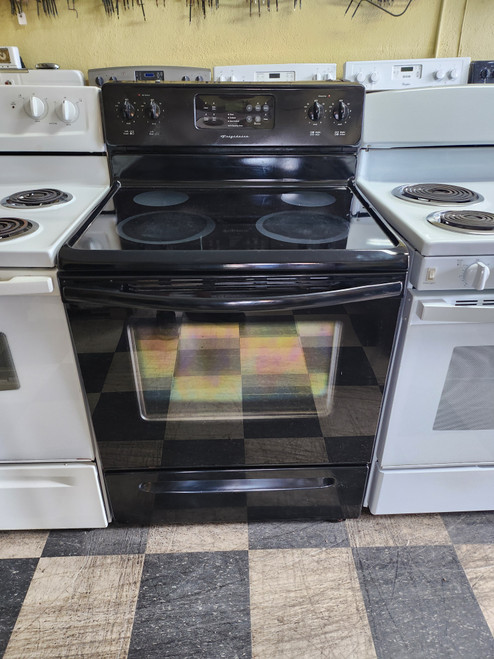 FRIGIDAIRE 30 INCH FREESTANDING ELECTRIC RANGE COIL BURNERS 2 LARGE 2 SMALL SELF CLEANING OVEN BLACK LOCATED IN OUR PORTLAND OREGON APPLIANCE STORE SKU 19619