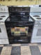 FRIGIDAIRE 30 INCH FREESTANDING ELECTRIC RANGE COIL BURNERS 2 LARGE 2 SMALL SELF CLEANING OVEN BLACK LOCATED IN OUR PORTLAND OREGON APPLIANCE STORE SKU 19619