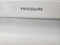 FRIGIDAIRE 30 INCH FREESTANDING ELECTRIC RANGE COIL BURNERS 2 LARGE 2 SMALL SELF CLEANING OVEN TOP OF OVEN DOOR HAS COSMETIC ISSUES SEE PIC WHITE LOCATED IN OUR PORTLAND OREGON APPLIANCE STORE SKU 19629