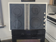 JENN-AIR 30 INCH DOWN DRAFT ELECTRIC COOKTOP 4 BURNER 1 LARGE DUAL 1 LARGE 2 SMALL MULTI SPEED DOWN DRAFT MOTOR WHITE LOCATED IN OUR PORTLAND OREGON APPLIANCE STORE SKU 19630