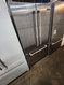 GE 17 CUBIC FOOT REFRIGERATOR TOP FREEZER ADJUSTABLE WIRE RACKS 2 CRISPER DRAWERS WITH GLASS COVER FULL WIDTH WIRE SHELF IN FREEZER WHITE LOCATED IN OUR POTLAND OREGON APPLIANCE STORE SKU 19633