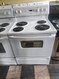 HOTPOINT 30 INCH FREESTANDING ELECTRIC RANGE COIL BURNERS 2 LARGE 2 SMALL MANUAL CLEAN OVEN WHITE LOCATED IN OUR PORTLAND OREGON APPLIANCE STORE SKU 19648
