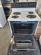 GE 30 INCH FREESTANDING ELECTRIC RANGE COIL BURNERS 2 LARGE 2 SMALL SELF CLEANING OVEN WHITE LOCATED IN OUR PORTLAND OREGON APPLIANCE STORE SKU 19650