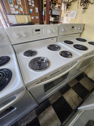 WHIRLPOOL 30 INCH FREESTANDING ELECTRIC RANGE MANUAL CLEAL OVEN COIL BURNERS 2 LARGE 2 SMALL WHITE LOCATED IN OUR PORTLAND OREGON APPLIANCE STORE SKU 19654