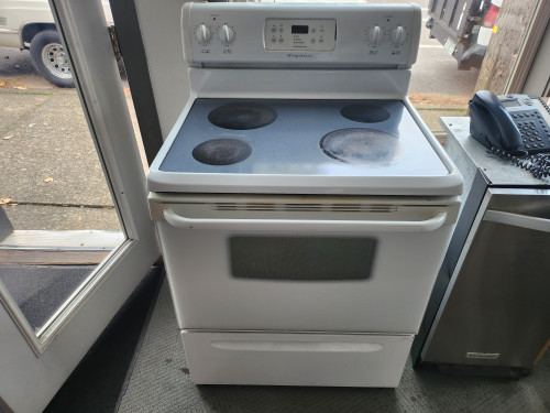 FRIGIDAIRE 30 INCH FREESTANDING GLASS TOP ELECTRIC RANGE 4 BURNER 2 LARGE 2 SMALL SELF CLEANING OVEN WHITE LOCATED IN OUR PORTLAND OREGON APPLIANCE STORE SKU 19655
