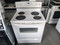 ESTATE BY WHIRLPOOL 30 INCH FREESTANDING ELECTRIC RANGE COIL BURNERS 2 LARGE 2 SMALL SELF CLEANING OVEN WHITE LOCATED IN OUR PORTLAND OREGON APPLIANCE STORE SKU 19656