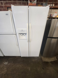 KENMORE SIDE BY SIDE REFRIGERATOR WITH ICE AND WATER GLASS SHELVES 3 STORAGE DRAWERS 2 GLASS SHELVES IN FREEZER PLUS 2 PULL OUT WIRE BASKETS WHITE LOCATED IN OUR PORTLAND OREGON APPLIANCE STORE SKU 19661