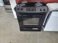 FRIGIDAIRE 30 INCH SLIDE-IN ELECTRIC RANGE COIL BURNERS 2 LARGE 2 SMALL SELF CLEANING OVEN STORAGE DRAWER BLACK LOCATED IN OUR PORTLAND OREGON APPLIANCE STORE SKU 19676